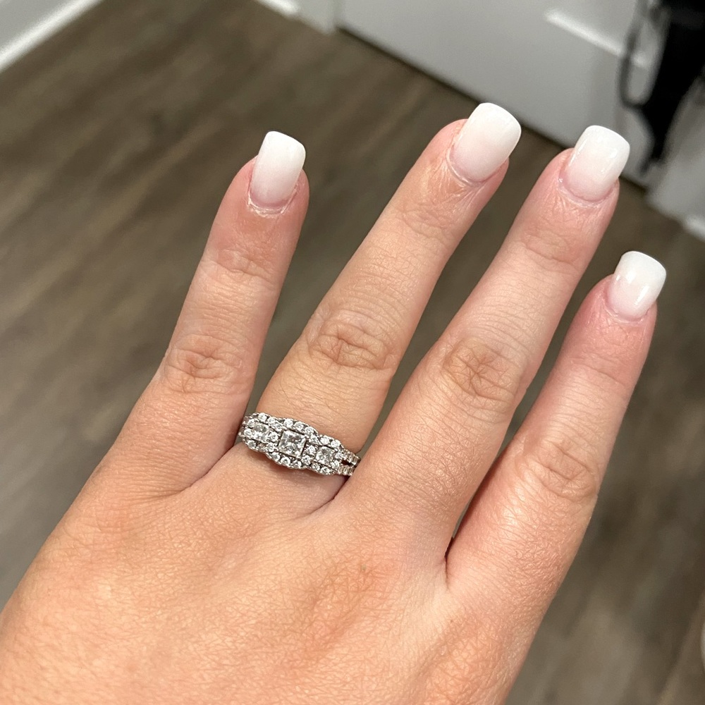 Leo Engagement ring and Kay Jewelers band